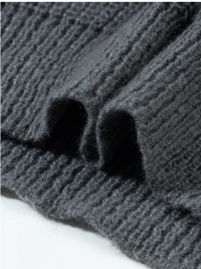 Lightweight, textured knit oversized sweater with a casual unisex style, featuring a minimalist design, relaxed loose fit, and classic crew neck
