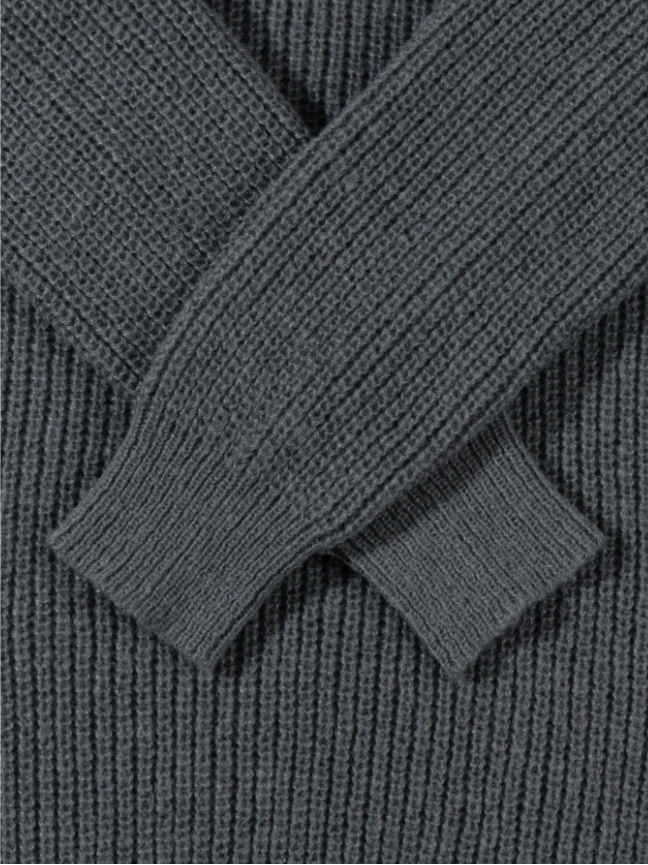 Lightweight, textured knit oversized sweater with a casual unisex style, featuring a minimalist design, relaxed loose fit, and classic crew neck
